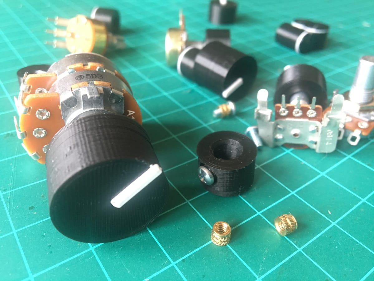 An assortment of 3D-printed potentiometer knobs